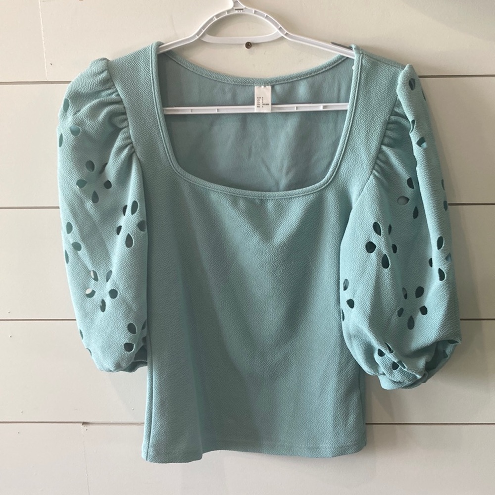 Teal square neck blouse.